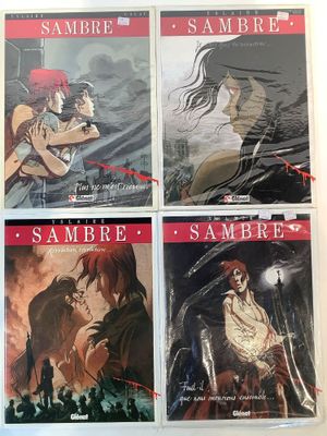 four covers of anime comics are shown on a white surface