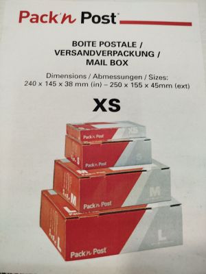 four boxes of mail sitting on top of each other