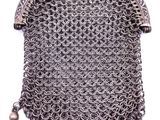 a close up of a chainmail purse on a white background