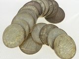 a lot of coins that are sitting on a table