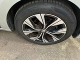 a close up of a tire on a car ' s rim