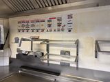 an image of a commercial kitchen with a lot of counter space
