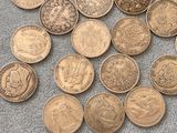 a lot of coins that are laying on the floor