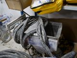 a bunch of hoses that are sitting on a cart