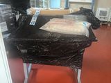 a table that has a bag on it in a store