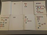 a lot of different stamps on the pages of a book