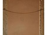 an old picture frame with a rope hanging from it ' s side