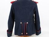 navy blue military jacket with red trims and buttons on a mannequin dummy
