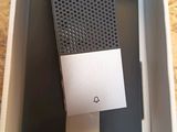 a box with a phone inside of it on a table