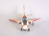a toy airplane that is sitting on a white surface