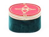a red and green box with a gold design on it