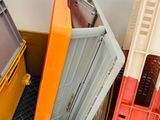many crates and crates that are stacked together in a box