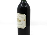 a bottle of wine that is sitting on a table