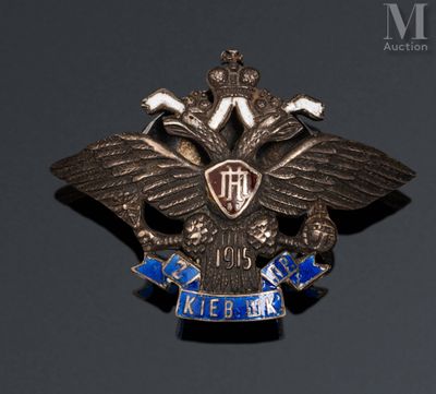 an image of a metal badge with a bird on it