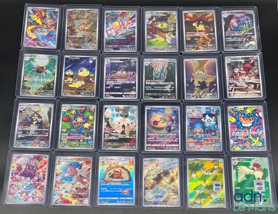 La collection de cartes Pokémon est exposée sur un fond noir.