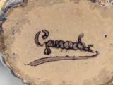 a close up of a piece of wood with the word grandpa written on it