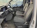 the interior of a car with the driver ' s seat folded down