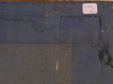 a picture of an old book with a tag on it