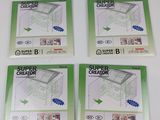 four packs of nintendo 3ds games are on a white table
