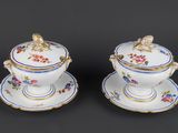 pair of antique porcelain sugar and creamers with floral decoration