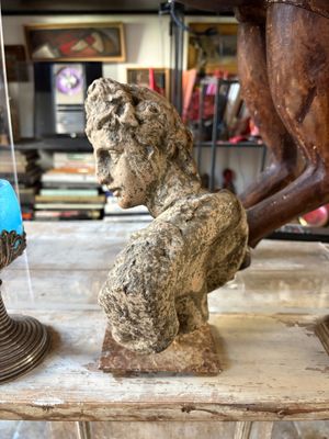 a statue of a horse and a statue of a dog on a table