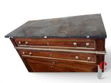 an image of a wooden chest of drawers with a marble top