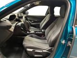 the interior of a blue car with two seats and a steering wheel