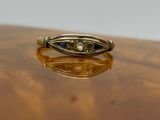 a close up of a ring on a wooden table