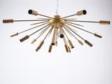 a large brass chandelier with eight lights hanging from the ceiling