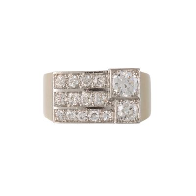 a close up of a diamond ring on a white background