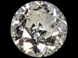 a close up of a diamond on a black background