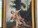 une photo d'un tableau accroché au mur près d'une fenêtre