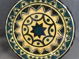 an image of a decorative plate with a star of david on it