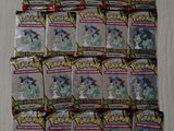 a close up of a pile of pokemon trading cards on a table