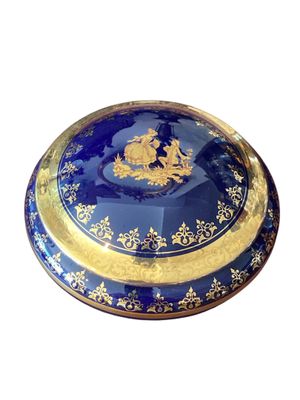 a blue and gold box with a picture on it