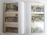 an open book with pictures of people and animals on it