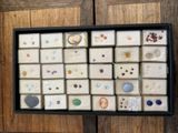 a picture of a picture of a display of buttons and buttons