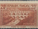a stamp with a picture of a bridge on it