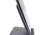 a cell phone that is sitting on top of a stand
