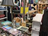 a room filled with lots of clothing and accessories