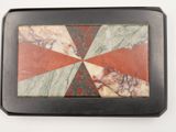 rectangular marble tray with red, white, and green geometric design