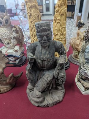a lot of figurines that are on a table