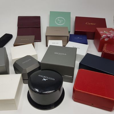 many boxes of different colors and sizes on the table