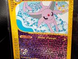 a close up of a pokemon card on a table