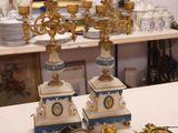 a lot of gold and blue items on the table
