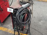 a lot of welding equipment on the ground in the parking lot