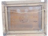 an old picture of a wooden frame with a picture of a man on it