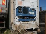 a truck that is parked next to a building