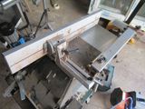 a machine that is sitting on a table in a garage
