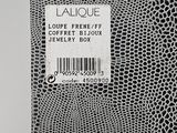 a close up of a black and white box with a label on it